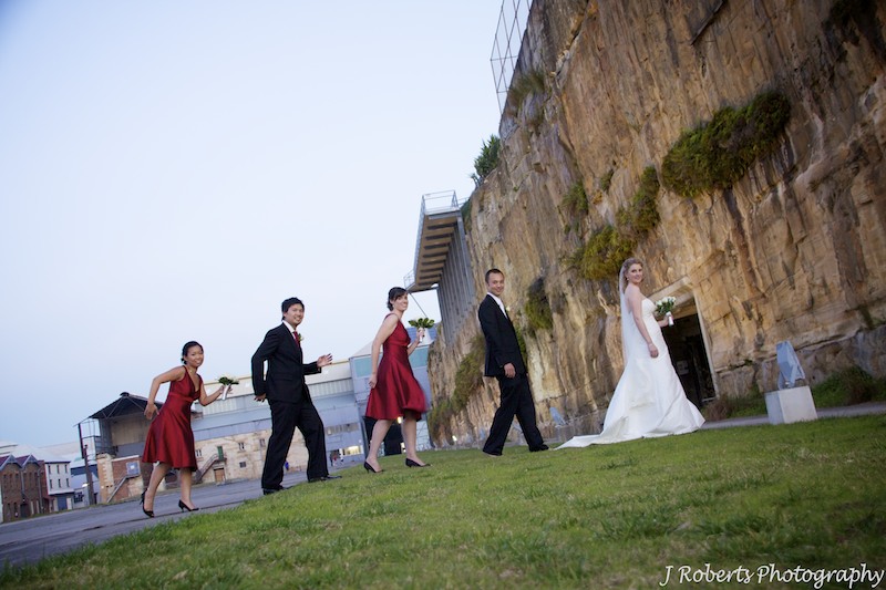 Bridal party reinacting abbey road album - wedding photography sydney